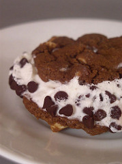 Chocolate White Chocolate Chip Cookie and Vanilla Bean Ice Cream Sandwiches.
