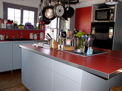 View of kitchen and island from southwest corner.